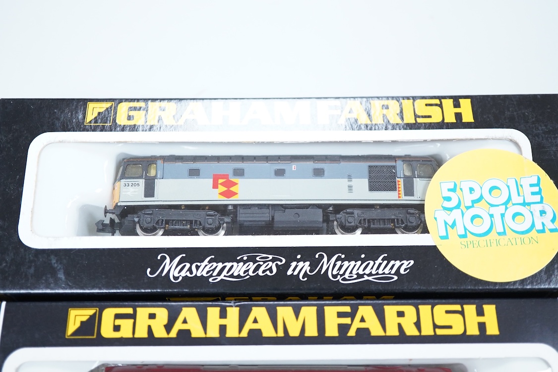 Four boxed Graham Farish N gauge railway Class 33 diesel locomotives; a BR, D6572 (8314), a BR Distribution Sector, 33 205 (8317), an EWS, 33030 (831A) and a BR, 33025 (8312).